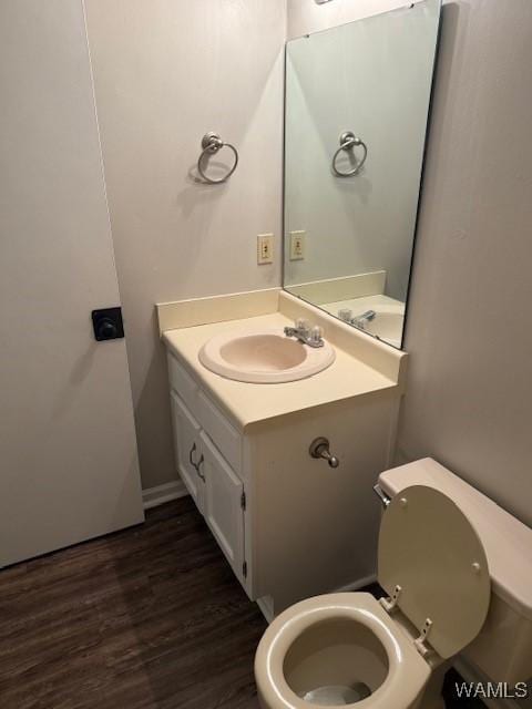 1813 Hackberry Ln Unit 10, Tuscaloosa, AL 35401 - half bathroom with vanity and wood finished floors
