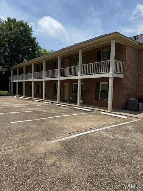 1813 Hackberry Ln Unit 10, Tuscaloosa, AL 35401 - view of building exterior with uncovered parking