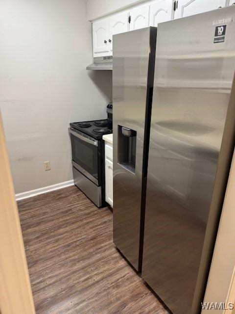 1813 Hackberry Ln Unit 10, Tuscaloosa, AL 35401 - kitchen with stainless steel appliances, white cabinets, dark wood-type flooring, and under cabinet range hood