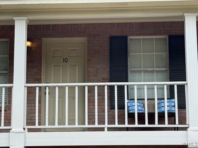 1813 Hackberry Ln Unit 10, Tuscaloosa, AL 35401 - property entrance featuring a porch