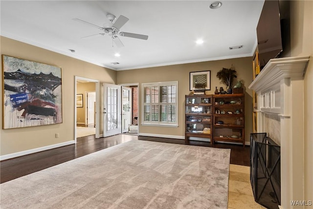 interior space featuring recessed lighting, visible vents, crown molding, and baseboards