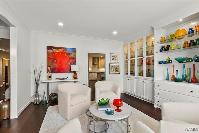 living area featuring recessed lighting, dark wood finished floors, and crown molding