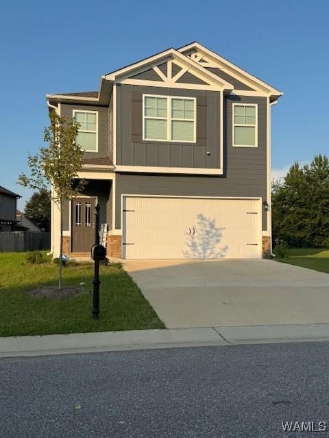 5574 Cheshire Cove Pl, Mccalla, AL 35111 - craftsman house with an attached garage, driveway, and a front yard