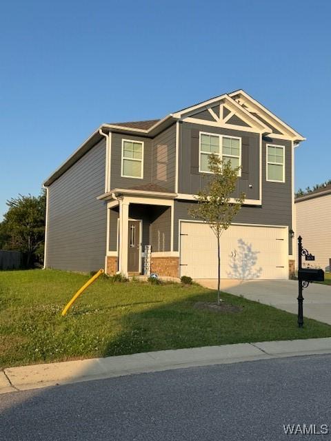 5574 Cheshire Cove Pl, Mccalla, AL 35111 - craftsman-style house featuring an attached garage, concrete driveway, and a front yard
