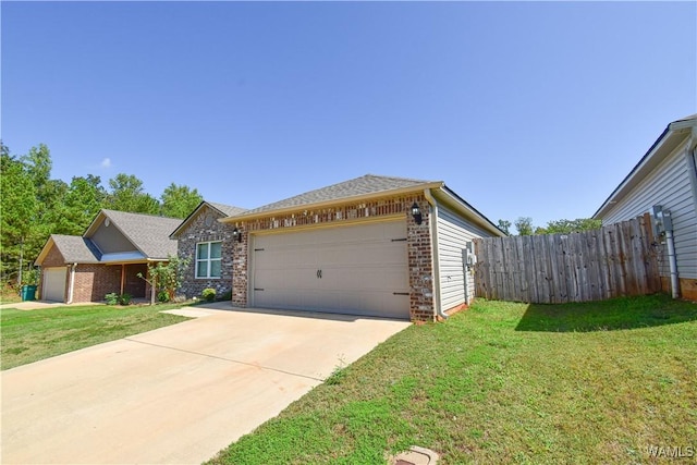 view of front of house with a front lawn and a garage