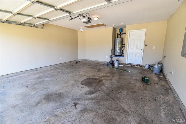 garage featuring a garage door opener and water heater