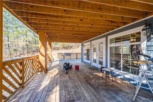 wooden deck featuring french doors