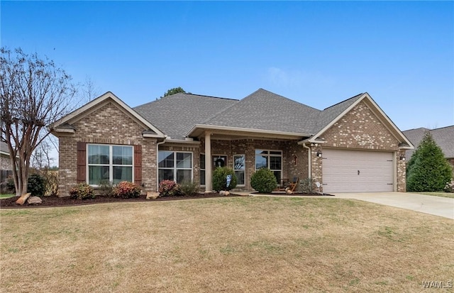 view of front facade featuring a garage and a front lawn