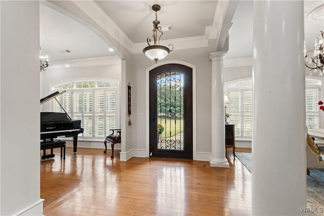 3610 Harbor Ridge Way, Tuscaloosa, AL 35406 - foyer featuring arched walkways, ornate columns, plenty of natural light, and crown molding