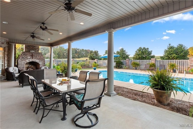 3610 Harbor Ridge Way, Tuscaloosa, AL 35406 - view of patio / terrace with an outdoor brick fireplace, a fenced backyard, a ceiling fan, and outdoor dining space