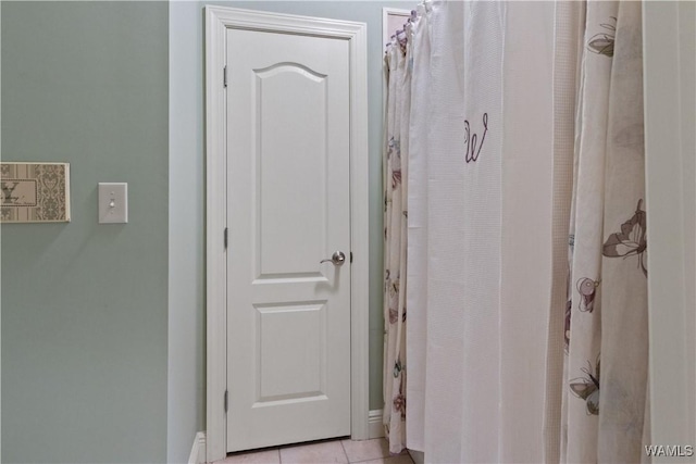 3610 Harbor Ridge Way, Tuscaloosa, AL 35406 - bathroom with tile patterned flooring, baseboards, and a shower with shower curtain