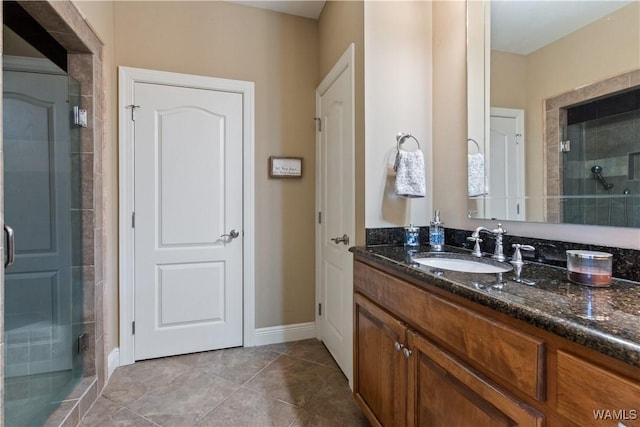 3610 Harbor Ridge Way, Tuscaloosa, AL 35406 - full bath featuring a stall shower, vanity, tile patterned flooring, and baseboards