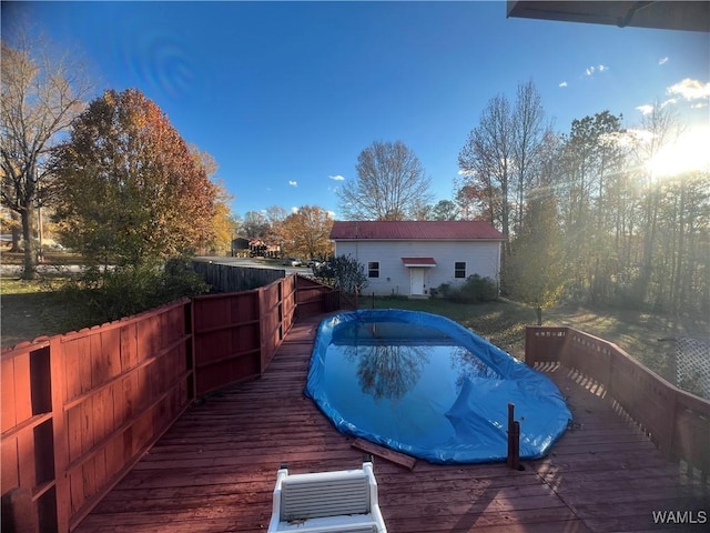 view of pool featuring a wooden deck