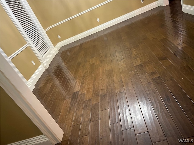 details featuring hardwood / wood-style flooring