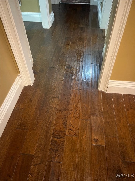 interior details featuring hardwood / wood-style flooring