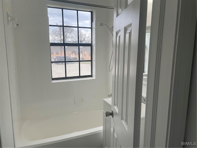 full bathroom with shower / tub combination