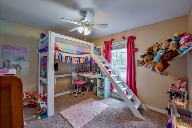 bedroom featuring ceiling fan and carpet floors