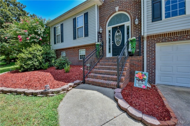 property entrance with a garage