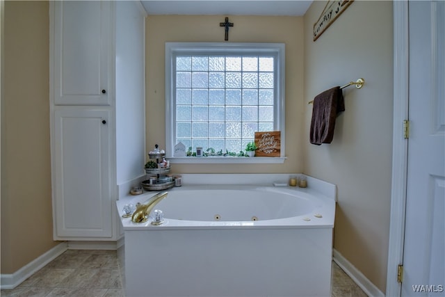 bathroom featuring tile patterned floors and a bathtub