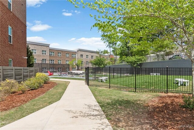 680 6th Ave NE Unit 3205, Tuscaloosa, AL 35404 - view of home's community with fence and a yard
