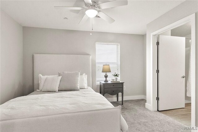680 6th Ave NE Unit 3205, Tuscaloosa, AL 35404 - carpeted bedroom featuring baseboards and a ceiling fan