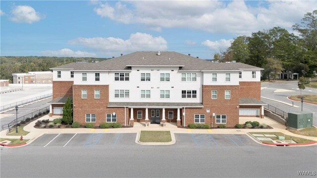 680 6th Ave NE Unit 3205, Tuscaloosa, AL 35404 - view of patio with an outdoor kitchen, fence, and a grill