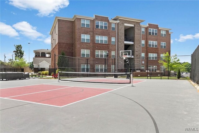 680 6th Ave NE Unit 3205, Tuscaloosa, AL 35404 - view of sport court featuring a tennis court, fence, and community basketball court