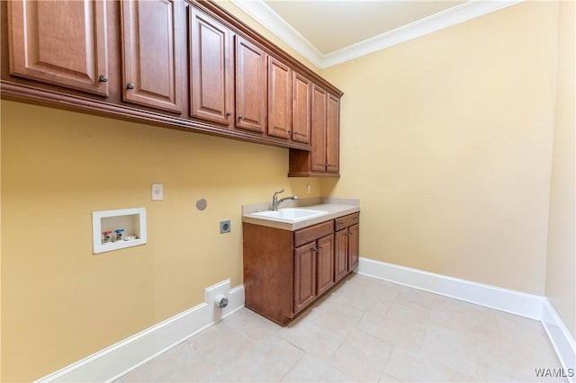 laundry area with crown molding, sink, hookup for a washing machine, electric dryer hookup, and cabinets