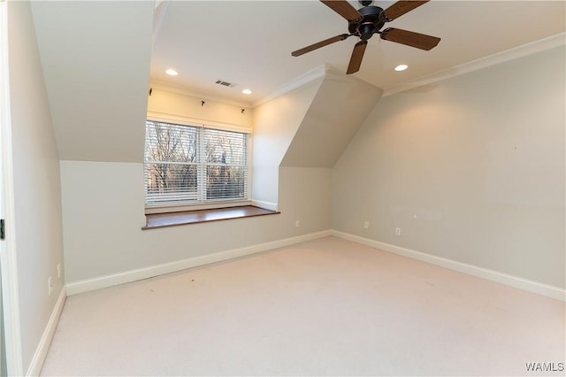 additional living space with ceiling fan, carpet, and lofted ceiling