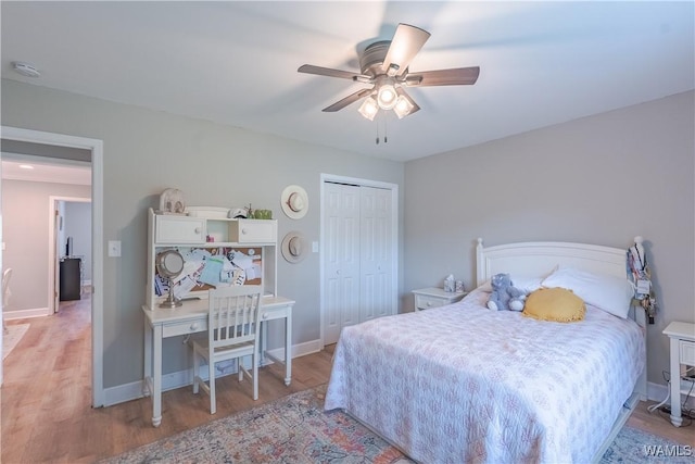 1603 Quail Run Dr, Tuscaloosa, AL 35406 - bedroom featuring light wood-style flooring, baseboards, a closet, and ceiling fan