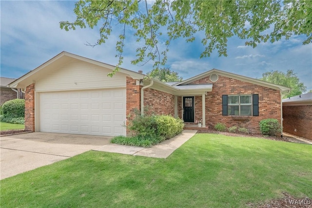 1603 Quail Run Dr, Tuscaloosa, AL 35406 - ranch-style house featuring a garage, brick siding, a front yard, and concrete driveway