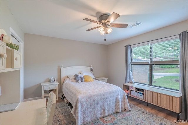 1603 Quail Run Dr, Tuscaloosa, AL 35406 - bedroom featuring wood finished floors and a ceiling fan