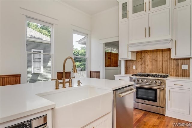 kitchen with white cabinets, sink, and stainless steel appliances