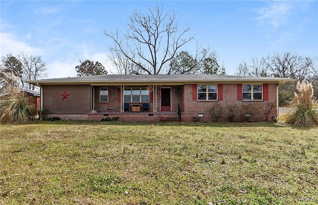 ranch-style home featuring crawl space, brick siding, and a front yard