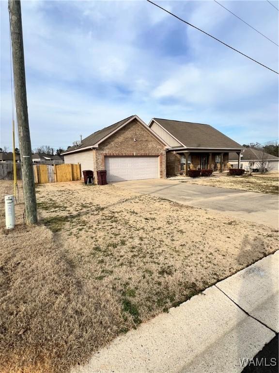 single story home featuring a garage