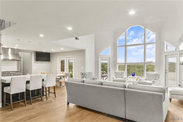 living room with light hardwood / wood-style flooring