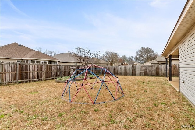 view of yard featuring a fenced backyard