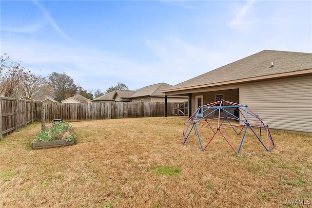 view of yard with a fenced backyard