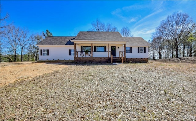 ranch-style home with a porch