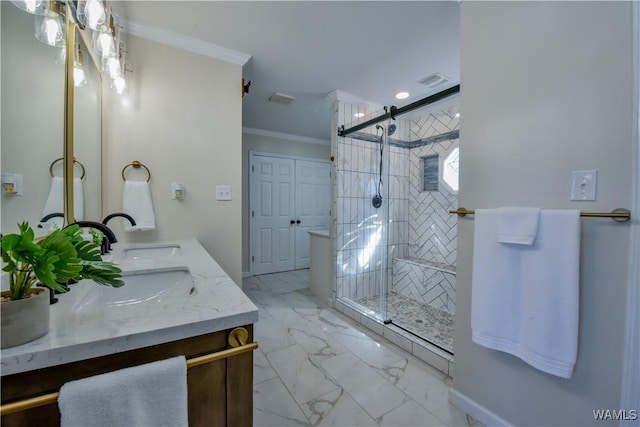 bathroom with marble finish floor, crown molding, double vanity, visible vents, and a stall shower