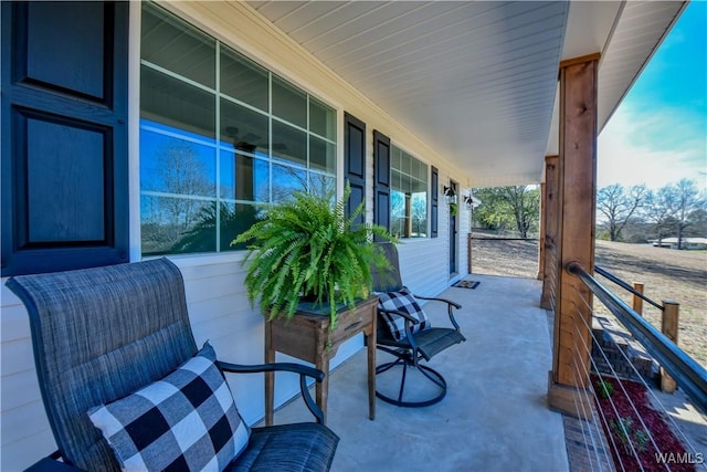 view of patio featuring a porch