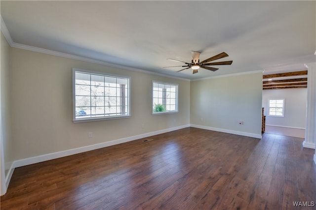 spare room with dark wood-type flooring, crown molding, ceiling fan, and baseboards