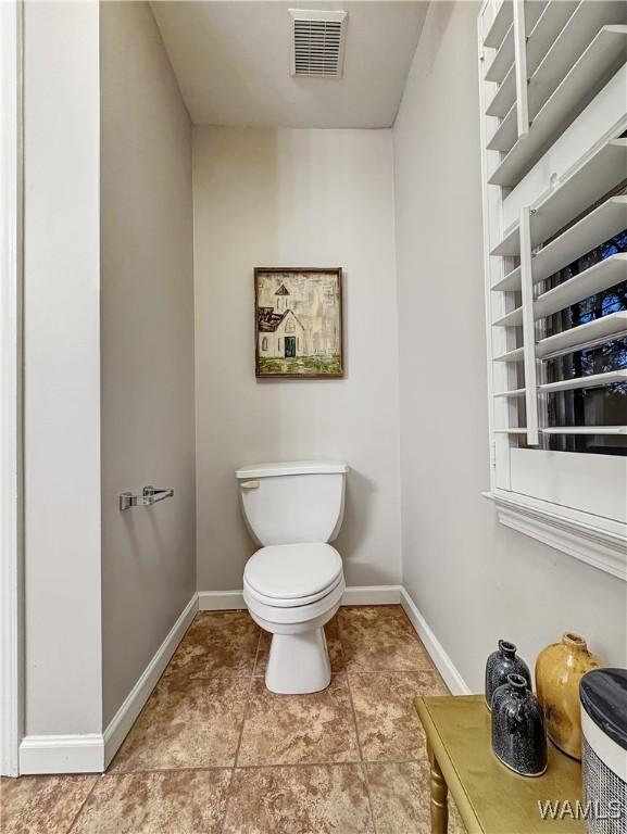 bathroom featuring toilet