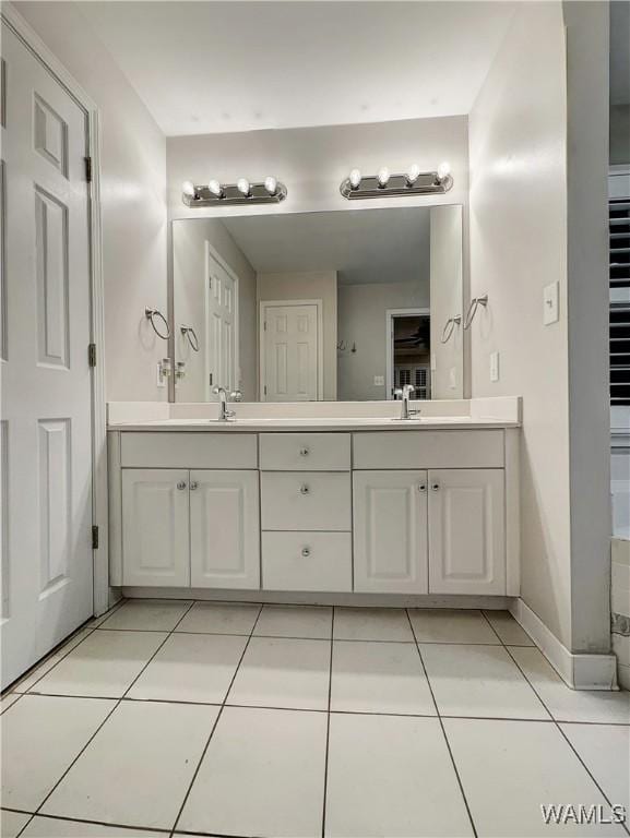 bathroom featuring vanity and tile patterned floors