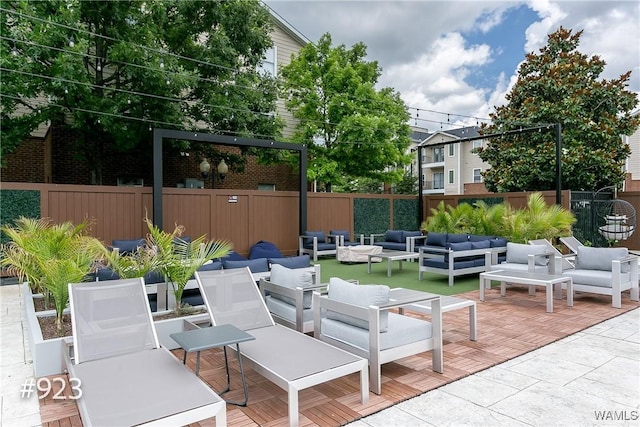 view of patio / terrace with outdoor lounge area and a fenced backyard