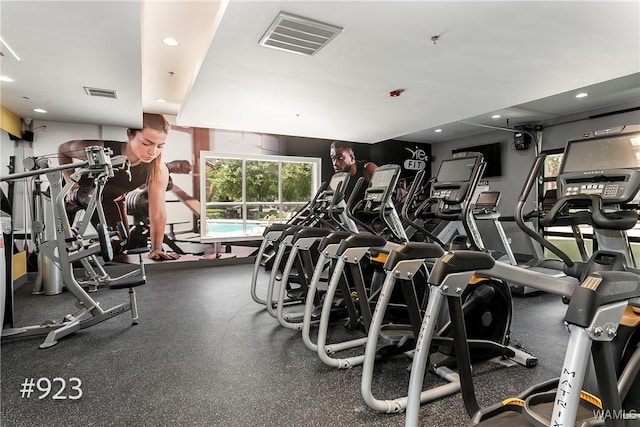 exercise room with recessed lighting and visible vents