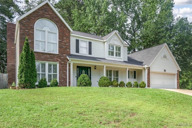 4410 Nicholas Ave, Northport, AL 35473 - view of front of house with brick siding, concrete driveway, a front lawn, and a garage