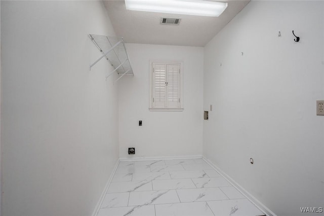 4410 Nicholas Ave, Northport, AL 35473 - washroom with hookup for an electric dryer and light marble finish floors