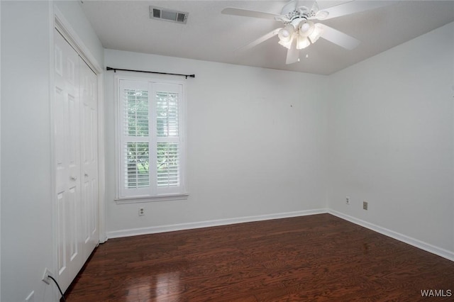 4410 Nicholas Ave, Northport, AL 35473 - unfurnished bedroom featuring dark wood-style floors, a closet, and a ceiling fan