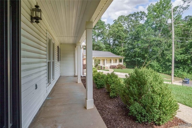 4410 Nicholas Ave, Northport, AL 35473 - porch with view of scattered trees